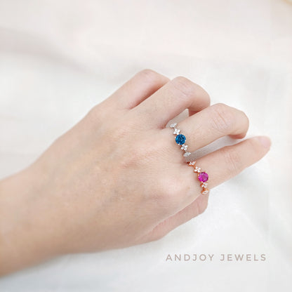 Round Rhodolite Garnet / London Blue Topaz Ring