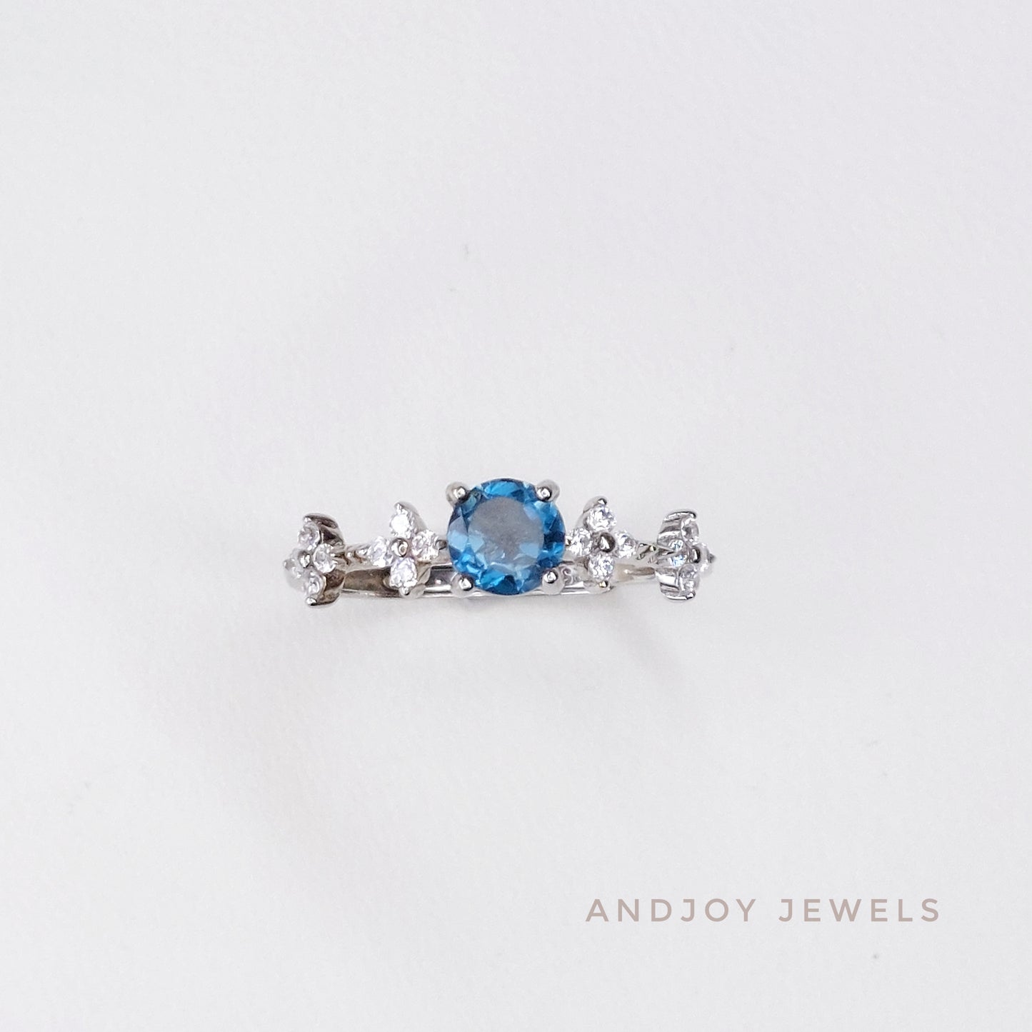 Round Rhodolite Garnet / London Blue Topaz Ring