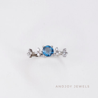 Round Rhodolite Garnet / London Blue Topaz Ring